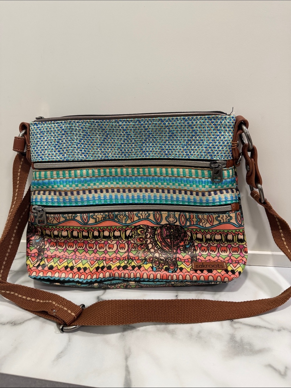 Sakroots Blue Green Pink Patterned Crossbody Bag with Brown Strap